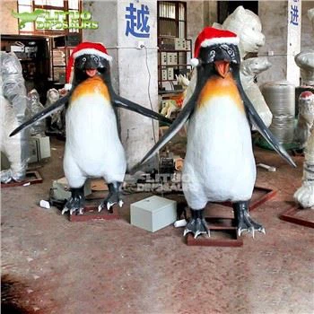 Pinguini animatronici de Crăciun